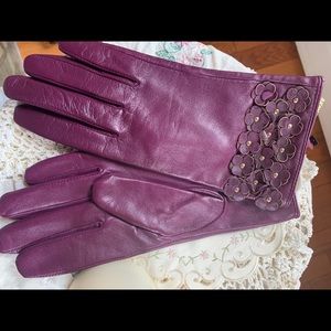 Burgundy leather gloves with polyester lining.